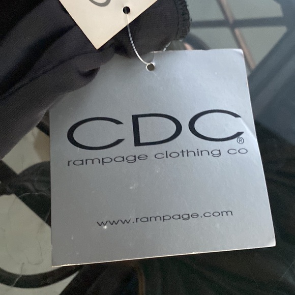 Black mesh over black shirt elastic waist band. - Picture 2 of 4